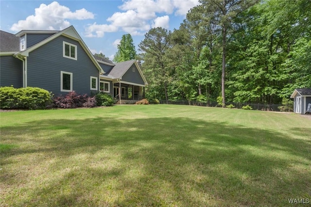 view of yard with fence