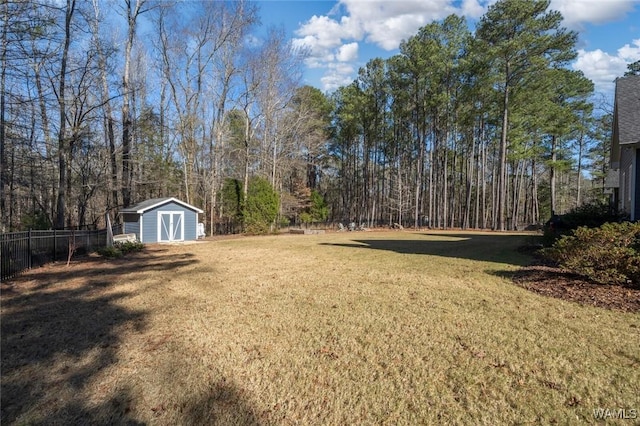 view of yard with a storage unit