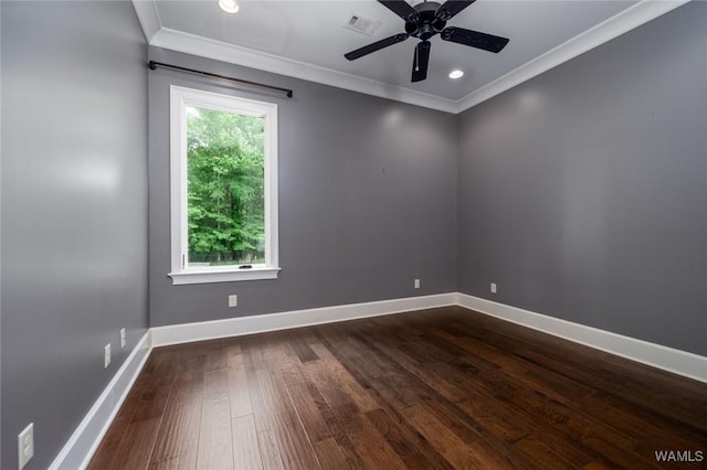 unfurnished room featuring visible vents, ornamental molding, dark wood-style flooring, and ceiling fan