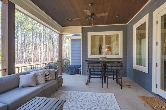 view of patio with outdoor lounge area and ceiling fan