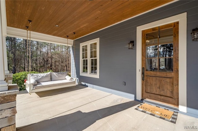 entrance to property with covered porch