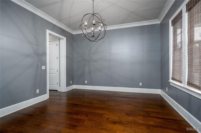 empty room with crown molding, a notable chandelier, and dark wood-style floors