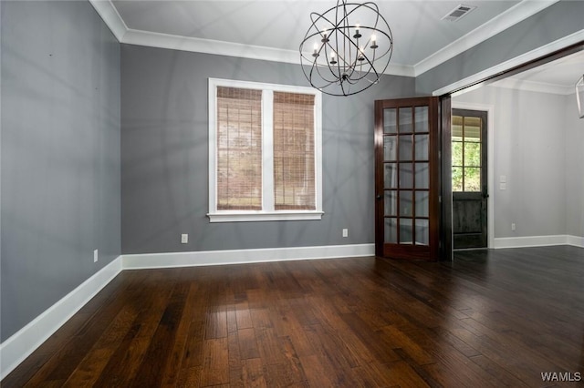 unfurnished dining area featuring crown molding, a notable chandelier, hardwood / wood-style flooring, and visible vents