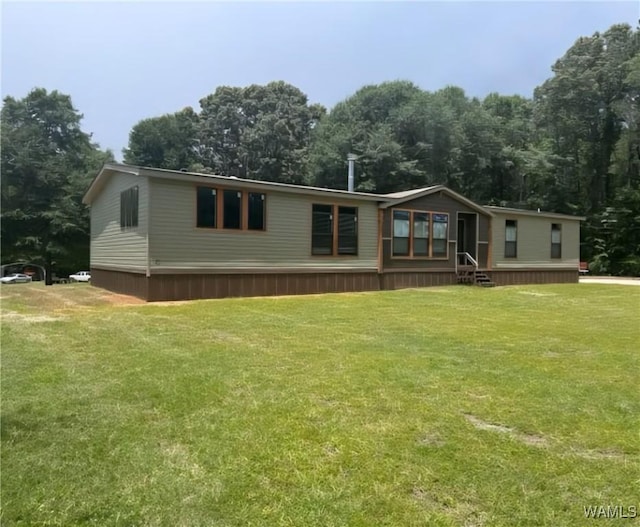 930 Pine Tree Rd, Centreville, AL 35042 - rear view of property with a lawn