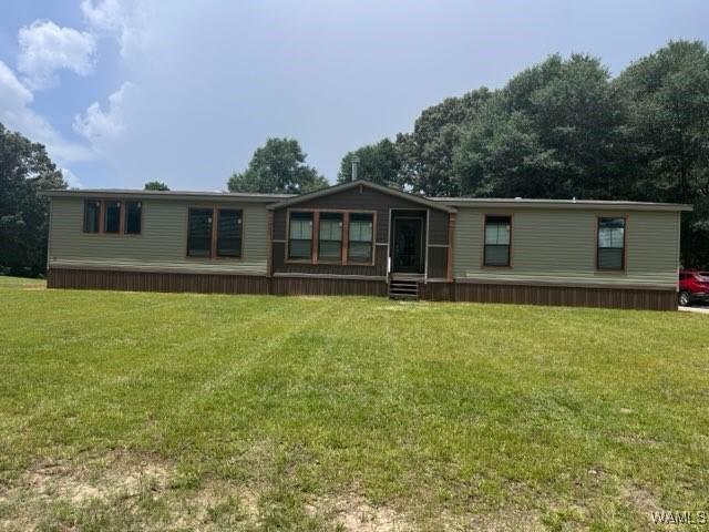 930 Pine Tree Rd, Centreville, AL 35042 - rear view of property with a yard