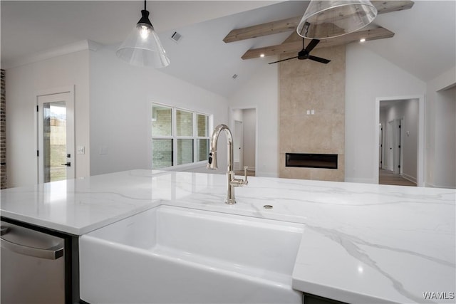 13947 Glenview Dr, Northport, AL 35475 - kitchen with plenty of natural light, visible vents, light stone counters, and a ceiling fan