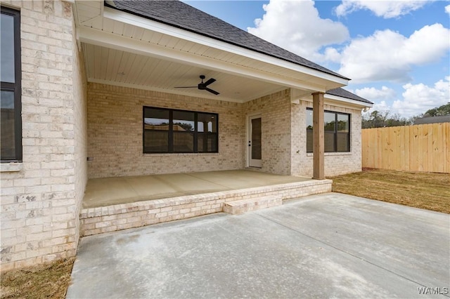 13947 Glenview Dr, Northport, AL 35475 - view of patio with ceiling fan and fence