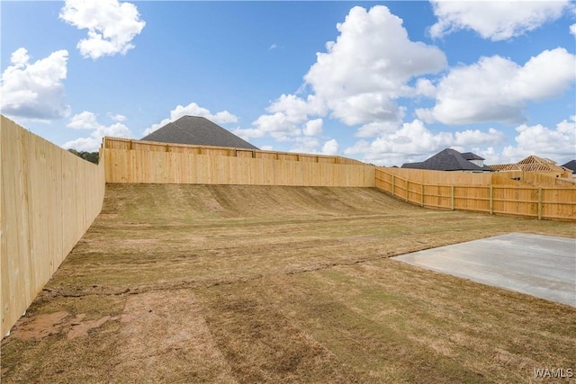 13947 Glenview Dr, Northport, AL 35475 - view of yard with a fenced backyard and a patio area