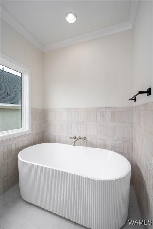 13947 Glenview Dr, Northport, AL 35475 - bathroom with a soaking tub, marble finish floor, recessed lighting, and ornamental molding