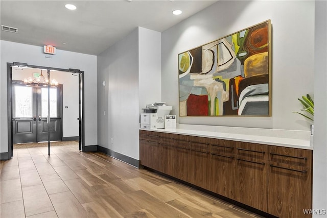 680 6th Ave NE Unit 3310, Tuscaloosa, AL 35404 - bathroom featuring a chandelier, baseboards, recessed lighting, and vanity