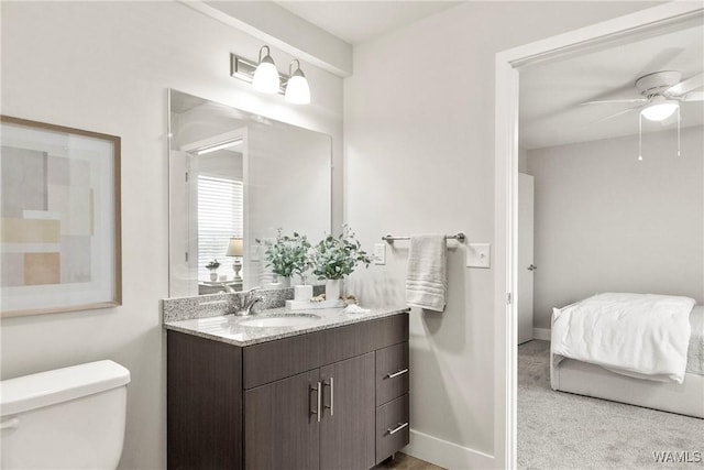 680 6th Ave NE Unit 3310, Tuscaloosa, AL 35404 - bathroom with vanity, toilet, ceiling fan, and baseboards