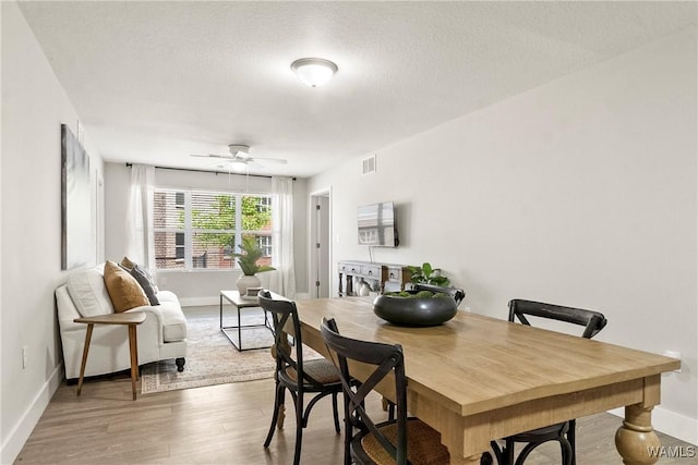 680 6th Ave NE Unit 3310, Tuscaloosa, AL 35404 - dining area with baseboards, wood finished floors, and a ceiling fan