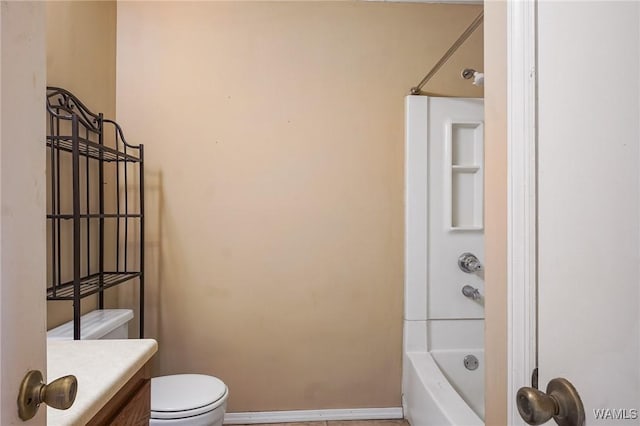 full bathroom with vanity,  shower combination, and toilet