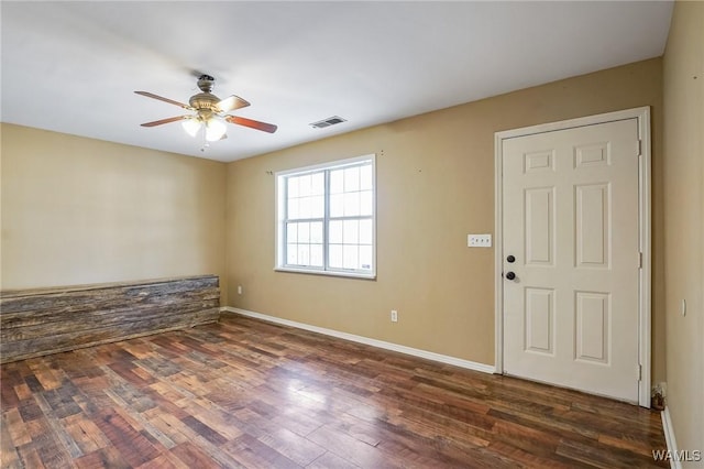 interior space featuring dark hardwood / wood-style floors and ceiling fan