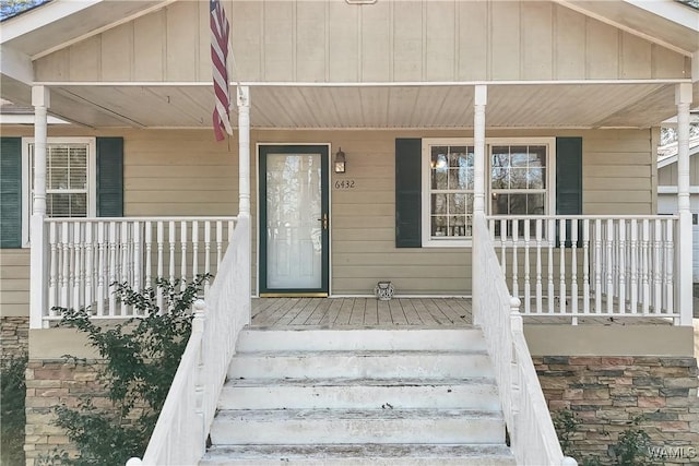 property entrance with a porch