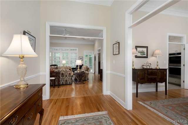 4032 Carousel Cir, Tuscaloosa, AL 35406 - hallway featuring light wood finished floors and ornamental molding