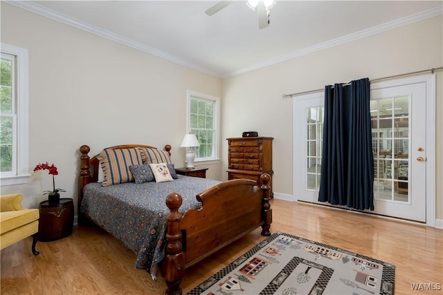 4032 Carousel Cir, Tuscaloosa, AL 35406 - bedroom with wood finished floors, crown molding, and multiple windows
