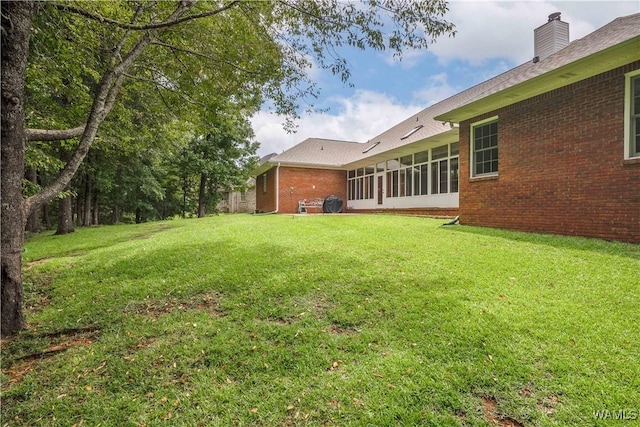4032 Carousel Cir, Tuscaloosa, AL 35406 - view of green lawn featuring a sunroom