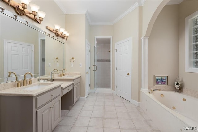 4032 Carousel Cir, Tuscaloosa, AL 35406 - bathroom with vanity, a shower stall, a jetted tub, crown molding, and tile patterned floors