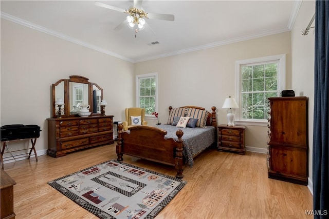 4032 Carousel Cir, Tuscaloosa, AL 35406 - bedroom featuring light wood finished floors, multiple windows, ornamental molding, and ceiling fan