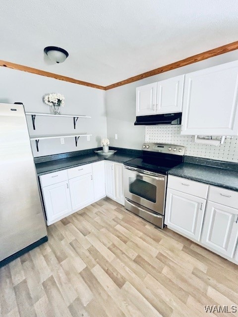 kitchen with appliances with stainless steel finishes, light wood-type flooring, backsplash, crown molding, and white cabinets