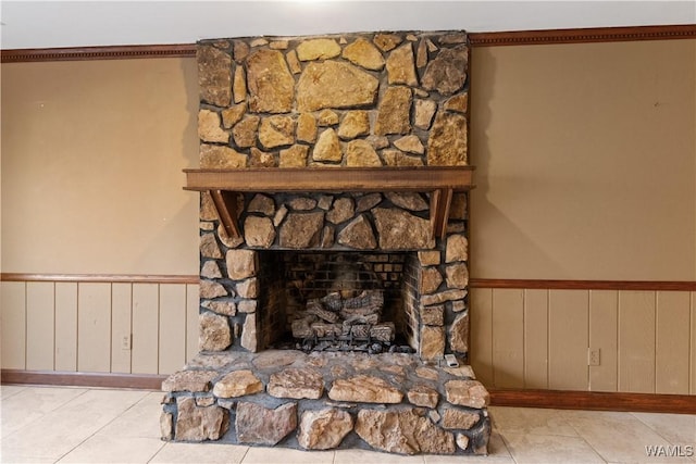 room details featuring a stone fireplace