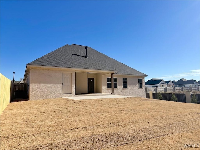 back of house featuring ceiling fan and a patio