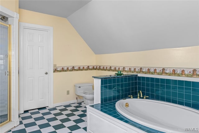 4184 Graves Gap Rd, Hayden, AL 35079 - bathroom with a stall shower, tile patterned floors, a garden tub, and vaulted ceiling