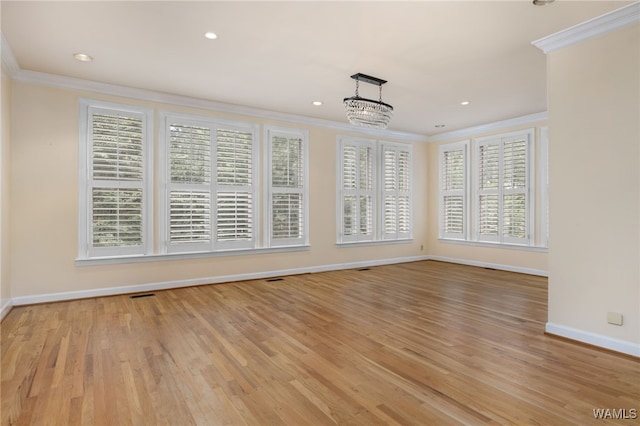 4184 Graves Gap Rd, Hayden, AL 35079 - spare room with crown molding, light wood-type flooring, and recessed lighting
