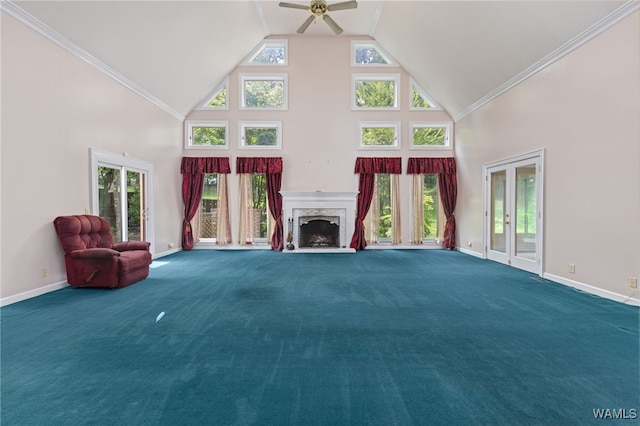4184 Graves Gap Rd, Hayden, AL 35079 - unfurnished living room with high vaulted ceiling, a ceiling fan, carpet flooring, a fireplace, and french doors