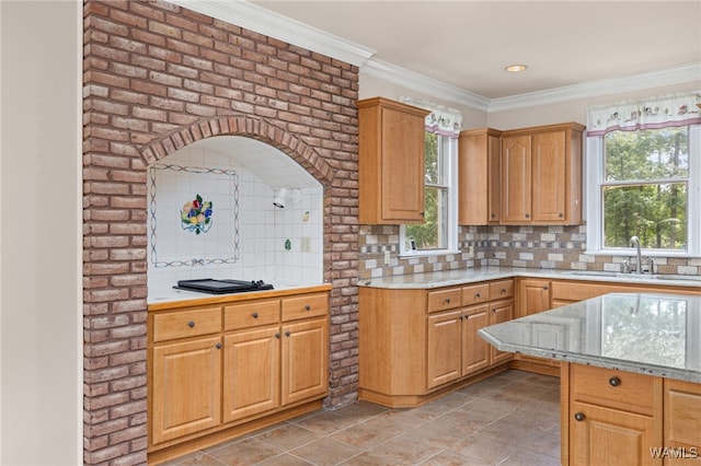 4184 Graves Gap Rd, Hayden, AL 35079 - kitchen with decorative backsplash, plenty of natural light, and ornamental molding