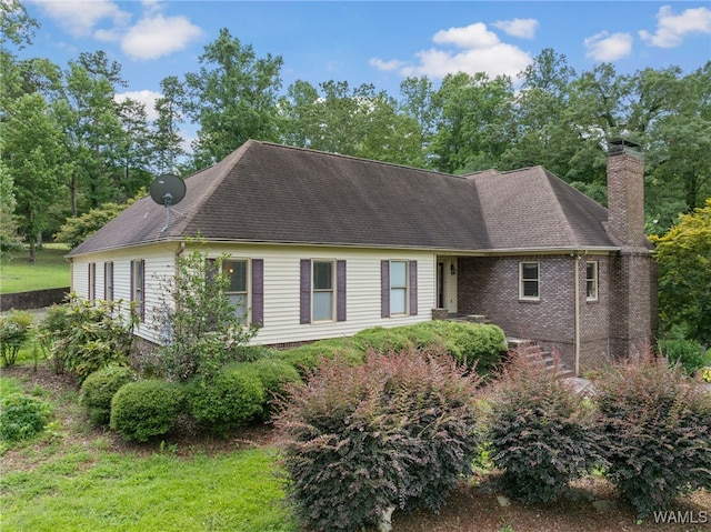 4184 Graves Gap Rd, Hayden, AL 35079 - view of front of home featuring a chimney, roof with shingles, and brick siding