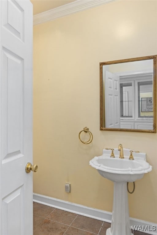 4184 Graves Gap Rd, Hayden, AL 35079 - bathroom with crown molding and tile patterned flooring