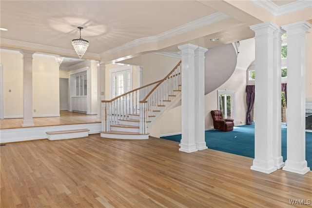 4184 Graves Gap Rd, Hayden, AL 35079 - entryway featuring light wood-style floors, ornamental molding, stairs, and ornate columns