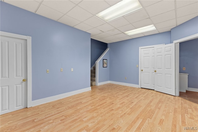 4184 Graves Gap Rd, Hayden, AL 35079 - unfurnished bedroom featuring a drop ceiling and wood finished floors