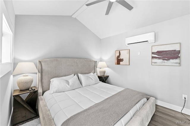 bedroom featuring lofted ceiling with beams, a ceiling fan, an AC wall unit, wood finished floors, and baseboards