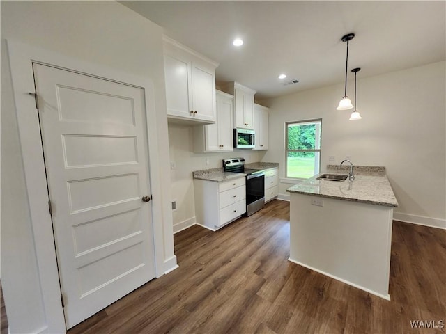 195 Lecroy Cir, Brent, AL 35034 - kitchen featuring stainless steel appliances, a sink, a peninsula, white cabinetry, and baseboards