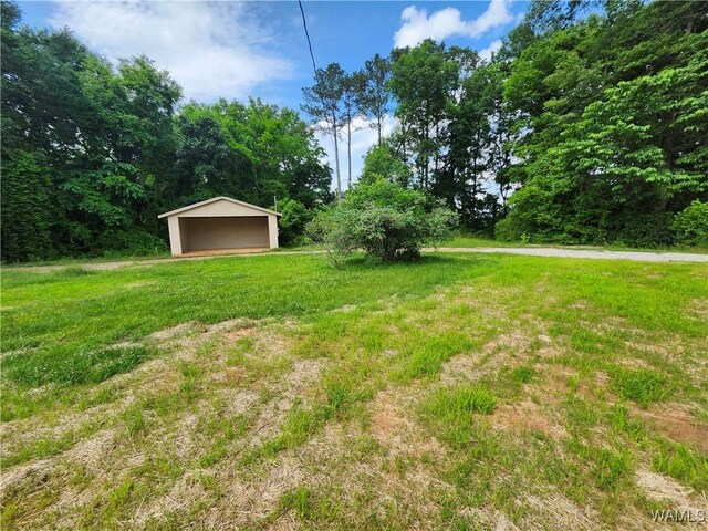 195 Lecroy Cir, Brent, AL 35034 - view of green lawn featuring an outdoor structure and a pole building