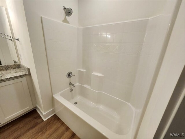 195 Lecroy Cir, Brent, AL 35034 - bathroom with wood finished floors, vanity, shower / washtub combination, and baseboards