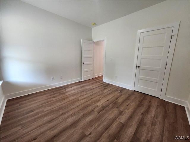 195 Lecroy Cir, Brent, AL 35034 - unfurnished bedroom with dark wood finished floors and baseboards