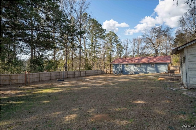 view of yard featuring a fenced backyard