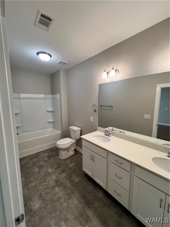 full bathroom featuring vanity, shower / bath combination, and toilet