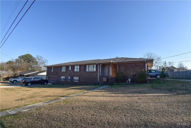 view of front of house with a front lawn