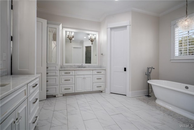 full bath with crown molding, marble finish floor, a freestanding bath, and vanity
