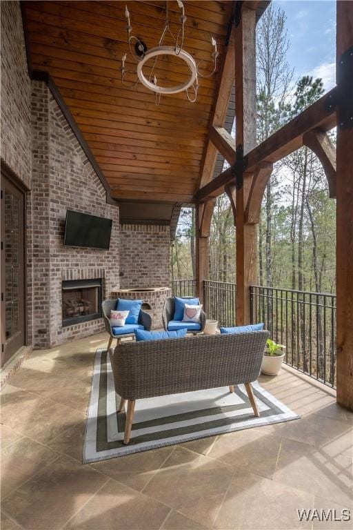 sunroom featuring a notable chandelier