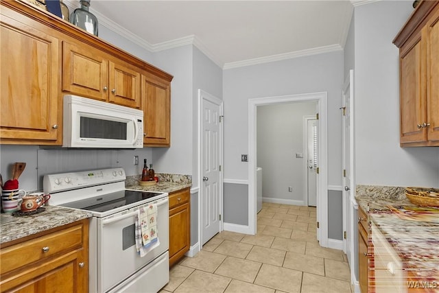 kitchen featuring white appliances, light tile patterned floors, crown molding, and light stone countertops