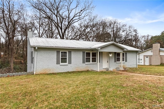 ranch-style home with a front yard