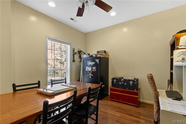 office space with ceiling fan and dark wood-type flooring