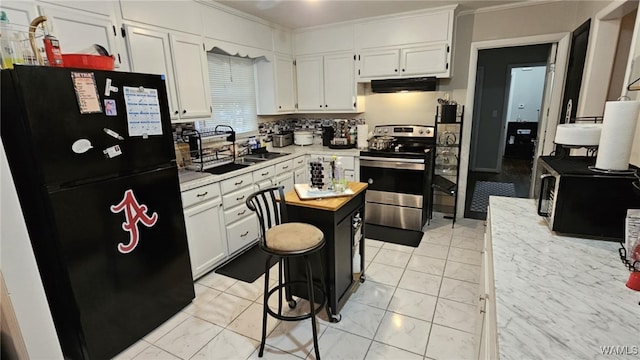 kitchen with tasteful backsplash, ornamental molding, sink, black appliances, and white cabinets