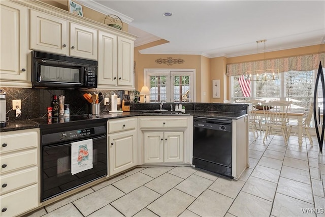 kitchen featuring a peninsula, cream cabinets, crown molding, black appliances, and a sink